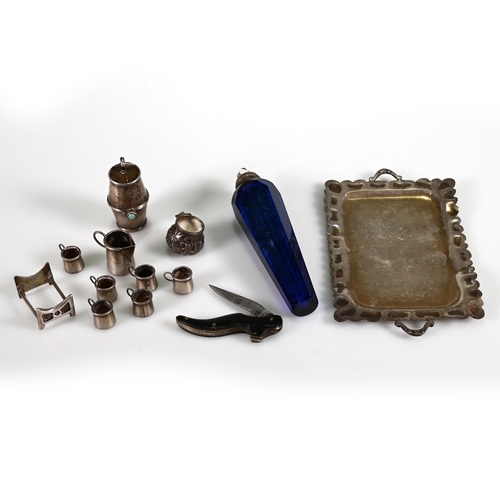 175 - A miniature tray, with six mugs, a jug and a barrel on stand, all unmarked; with a small folding kni... 