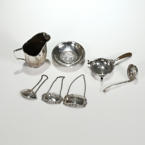 177 - A good Victorian silver sifting spoon, John Figg, London 1852, 10cm long, 33 grams gross; a Victoria... 