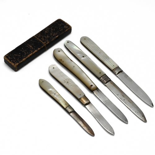 185 - A collection of mother of pearl handled folding fruit knives with silver blades, one Georgian andone... 