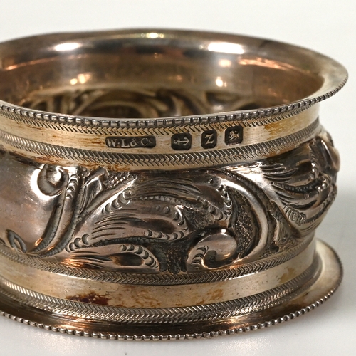 190 - A cased set of six silver napkin rings, all monogrammed G; with tow cased pairs of silver napkin rin... 