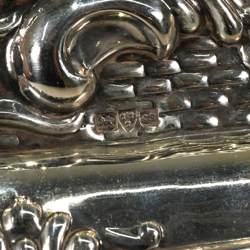 198 - An Edwardian silver dressing table tray, J & R Griffin, Chester 1905, embossed with rococo scrolls a... 