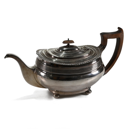 201 - A tea pot, Z. Barraclough & Sons, Sheffield 1914, in the Georgian style, of rounded rectangular outl... 