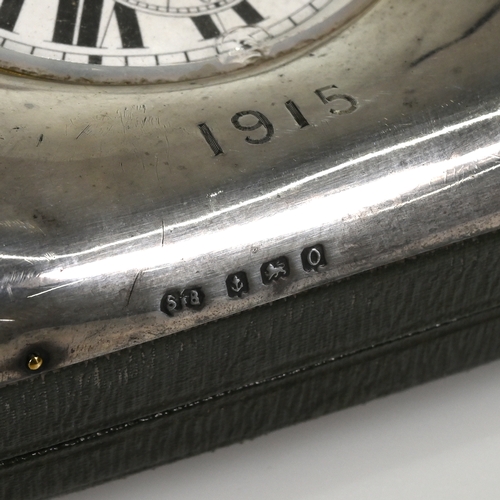 213 - A Goliath watch in a silver fronted travelling case, inscribed.