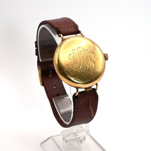 215 - Gentleman's wristwatch in 18ct gold case, monogrammed, with leather strap, the dial marked Curtis 17... 