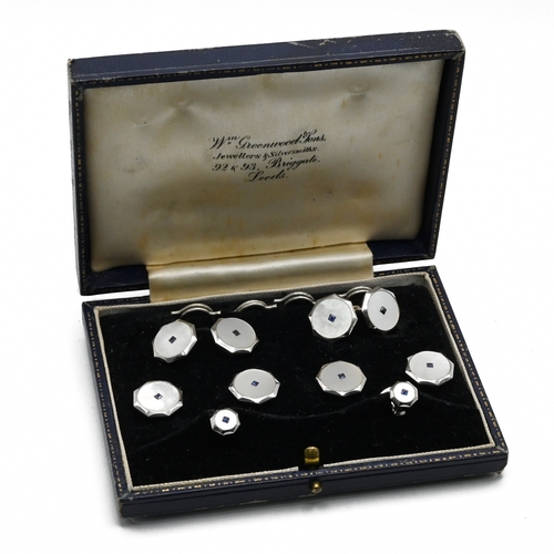 22 - A 9 carat white gold mother of pearl and sapphire dress set, Birmingham 1953, comprising a pair of c... 