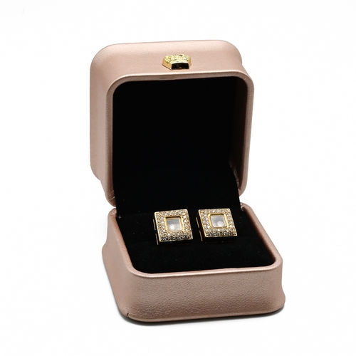 23 - Chopard, a pair of Happy Diamond ear clips, stamped ‘Chopard’, ‘750’, 9218858, and 84/2618-20, of sq... 