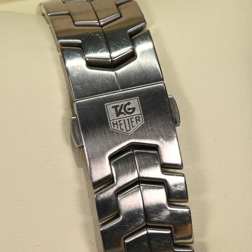 236 - Tag Heuer, Link, Calibre 6, a gents stainless steel bracelet watch, with movement view glazed case b... 