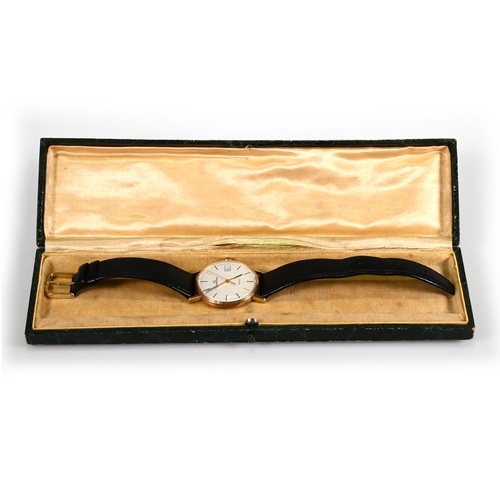 240 - Garrard, a gentleman’s 9 carat gold quartz wrist watch, the signed white dial with gilt black baton,... 