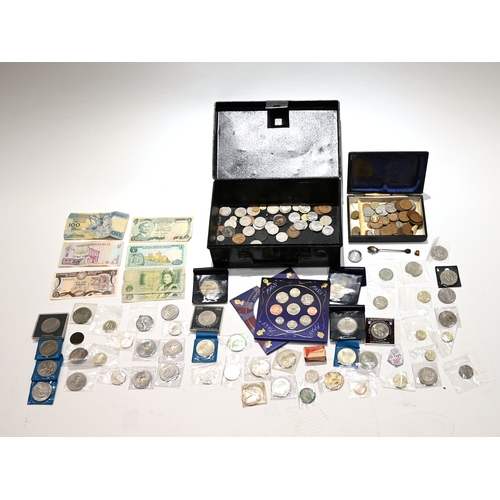 255 - A metal deed box with contents to include silver Morgan dollar, silver coffee bean teaspoon, silver ... 