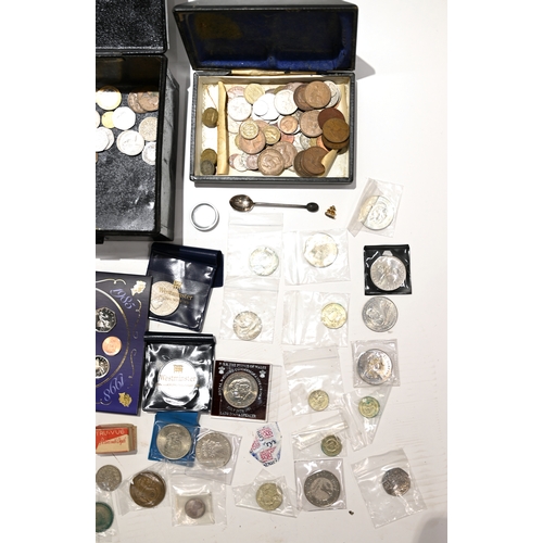 255 - A metal deed box with contents to include silver Morgan dollar, silver coffee bean teaspoon, silver ... 