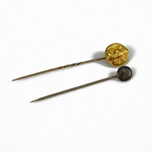 261 - A Persian style gold Daric coin, later mounted on a stick pin, along with one another silver coin wi... 