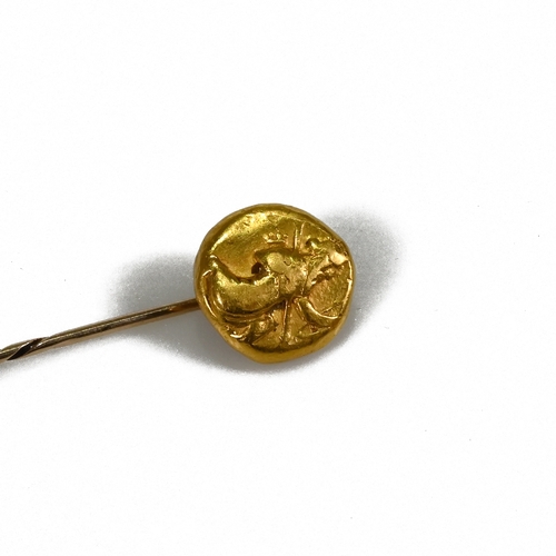 261 - A Persian style gold Daric coin, later mounted on a stick pin, along with one another silver coin wi... 