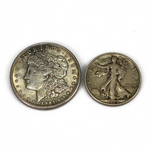 262 - A pair of United States .900 silver coins. 1921 Silver 'Morgan' Dollar and 1939 Silver 'Walking Libe... 