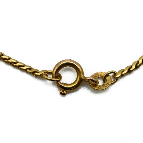 29 - A cross pendant on a chain, both stamped ’750’, 8.4 grams gross. 