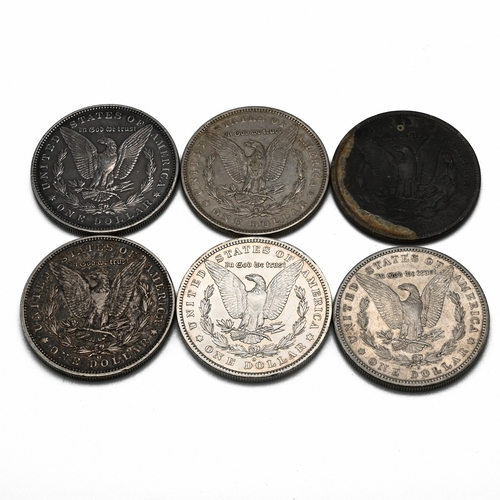 298 - A group of six United States silver 'Morgan' dollars, ( Morgan Dollars were issued between 1878 and ... 