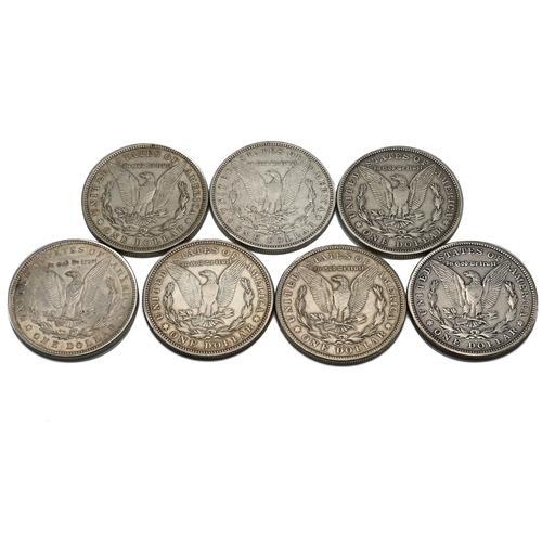 299 - A group of six United States silver 'Morgan' dollars. (Morgan Dollars were issued between 1878 and 1... 