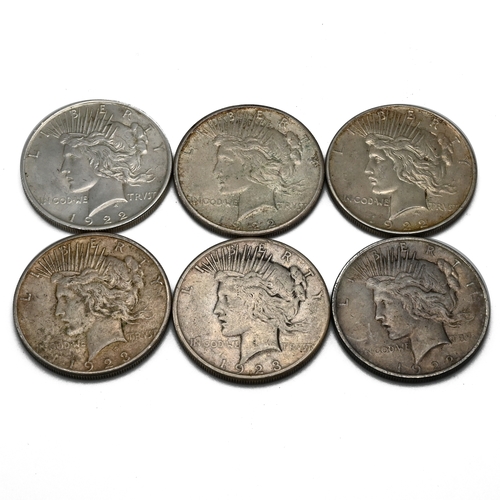 300 - A group of six United States 'Peace' dollars (which were minted between 1921 and 1935 and are made o... 