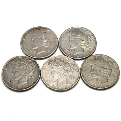 301 - A group of six United States 'Peace' dollars (which coins were minted between 1921 and 1935 and are ... 