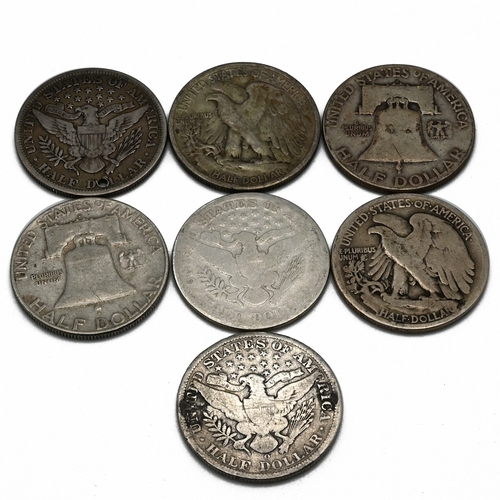302 - A group of seven United States silver half dollar coins to include: 'Barber' Type - 1899, 1899 (Hole... 