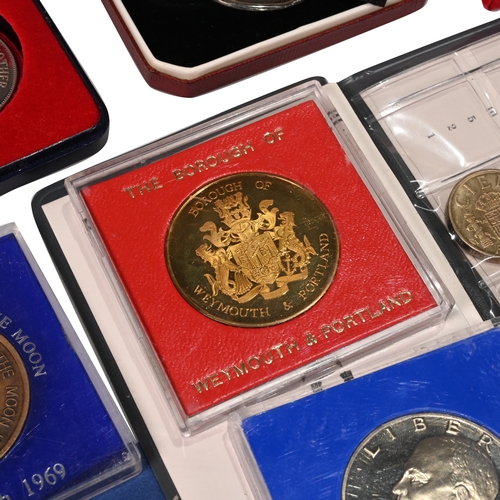 305 - An assortment of GB and world coins, medallions and tokens to include: WWII War and Defence Medal Pa... 