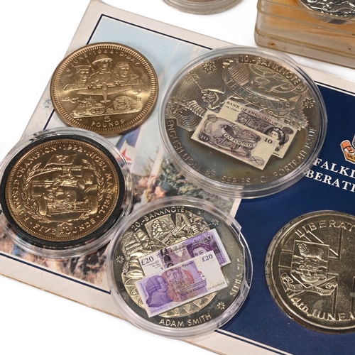 305 - An assortment of GB and world coins, medallions and tokens to include: WWII War and Defence Medal Pa... 