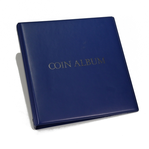 307 - A blue coin collector's album, interior having three pages of GB and World coins, silver and bronze ... 