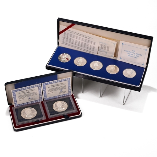 322 - A pair of silver proof coin sets, both issued in commemoration of the Silver Jubilee of Queen Elizab... 