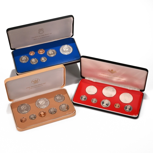 324 - Three proof coin sets to include: 1976 Cayman Islands proof coins set, Five Dollars to 1 Cent, 4 hig... 