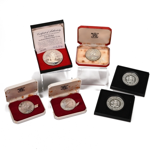 328 - A collection of six silver proof coins issued during the 1970s for various nations and territories.T... 