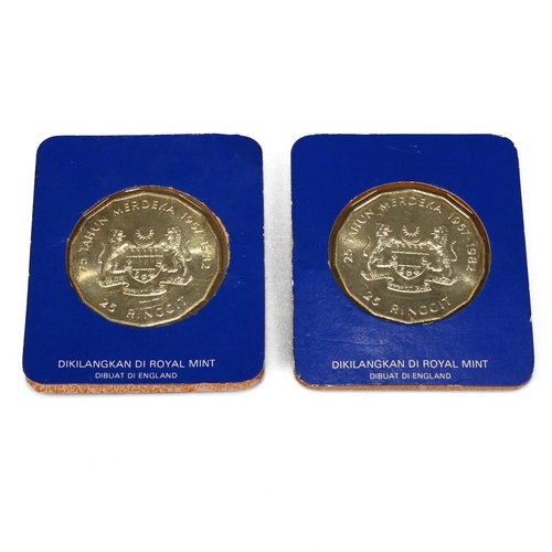 329 - A pair of sterling silver coins issued in Malaysia in 1982 to commemorate the 25th anniversary of in... 