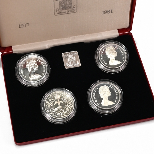 339 - A set of four sterling silver crowns comprising the 1972 wedding anniversary crown, 1977 silver jubi... 