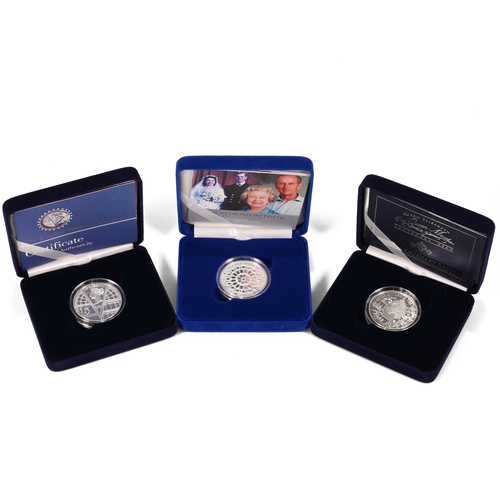 352 - An assortment of three silver proof crown coins to include: 2000 Queen Mother centenary crown; 2001 ... 