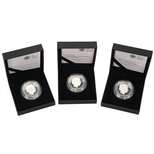 355 - A trio of Royal Mint silver proof £5 coins to commemorate the Birthday of Prince Charles, the annive... 