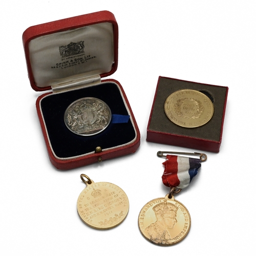 370 - A group of four medallions issued to commemorate the coronations of various British monarchs through... 