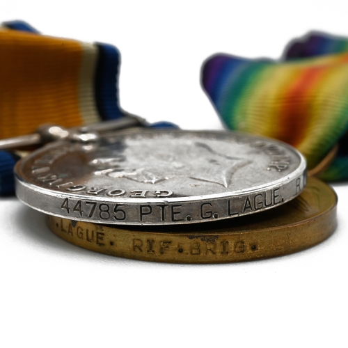 378 - A Pair of World War One medals to include the silver war medal and the victory medal issued to G. La... 