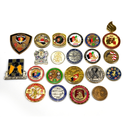 386 - A group of twenty one early 21st Century Military US challenge coins collected during the Afghanista... 