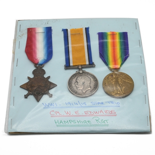 388 - A World War One medal trio comprising a 1914-15 Star, Silver War Medal and a Victory Medal to Cpl. W... 