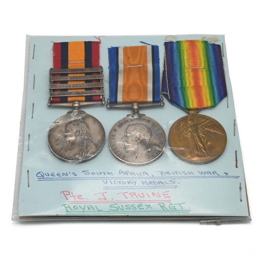 395 - A group of three medals to include: Queen's South Africa Medal, Silver War Medal and WWI Victory Med... 