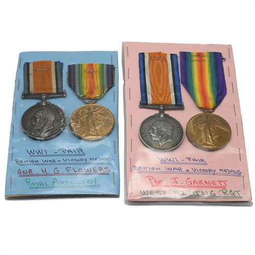 399 - Two groups of World War One medals each comprising a 1914-18 War Medal and a Victory Medal awarded t... 