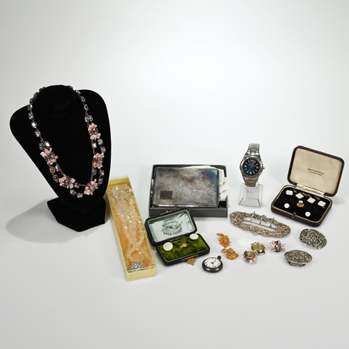 40 - A collection of costume jewellery to include a Victorian silver buckle, two boxed sets of studs and ... 