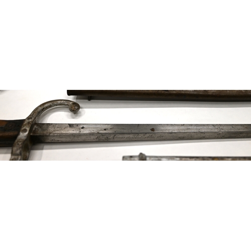 422 - A French Chassepot bayonet with Yataghan blade and scabbard, 1869 with registration numbers to hilt ... 