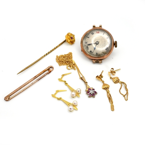 44 - A 15 carat gold stickpin; a lady’s 9 carat gold wrist watch, head only; two pairs of 9 carat goldear... 