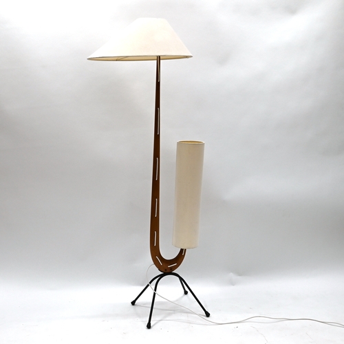 448 - A mid Century French floor lamp by Jean Rispal designed in 1950. Teak body with metal legs, the
form... 