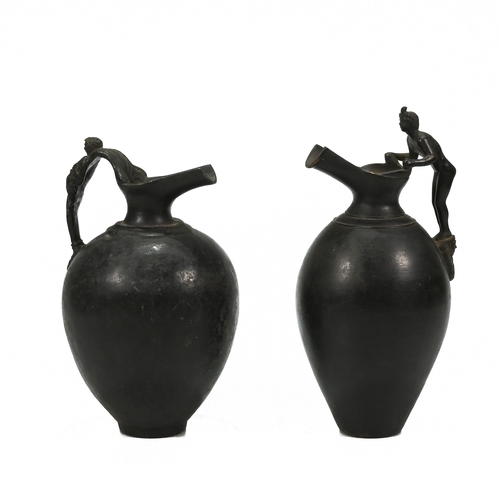 449 - A 19th century bronze Grand Tour bulbous pitcher, the handle formed of reclining classical lady. Alo... 