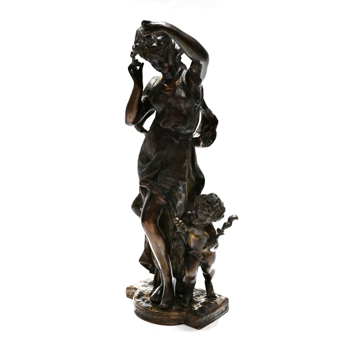 456 - A hollow cast bronze sculpture of a nymph and putto. H 47.5cm, W 18cm.