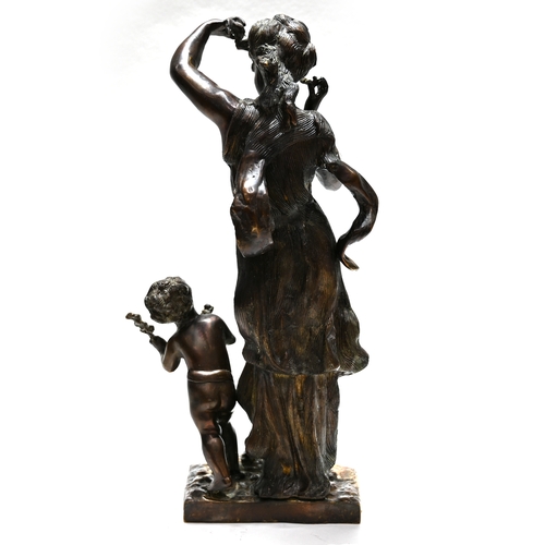 456 - A hollow cast bronze sculpture of a nymph and putto. H 47.5cm, W 18cm.