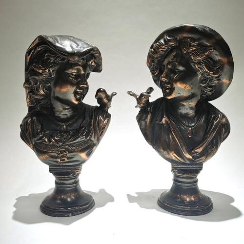 463 - In the manner of August Moreau - a pair of bronzed hollow cast metal busts - a boy and girl each wit... 