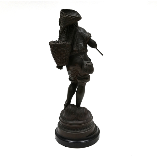 465 - A spelter figure of a boy cockle picker on ebonised wooden socle. Height 49cm (inc socle) 45cm (figu... 