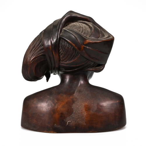 474 - A carved hardwood bust of an African lady. H 29cm, W 26cm, D 20cm.