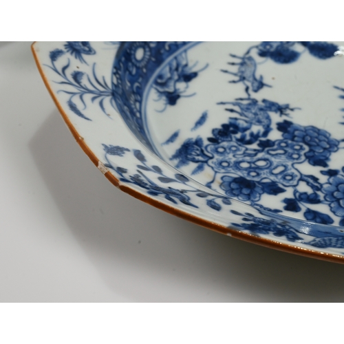 488 - A pair of blue and white Chinese Jingdezhen octagonal plates or shallow bowls with underglaze decora... 